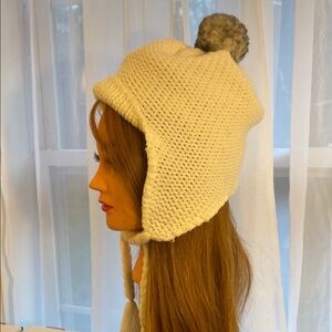 Cozy off white Knit Pom-Pom Hat with braided ties and tassels (one size)